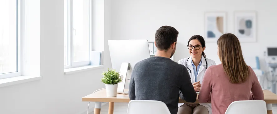 Primary care physician consulting with a couple